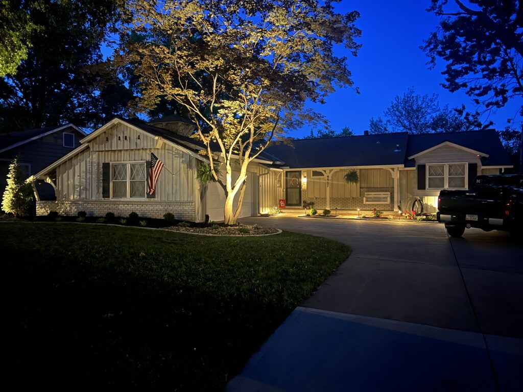 House with exterior landscape lighting