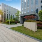 Exterior of commercial building with landscaping and hardscapes