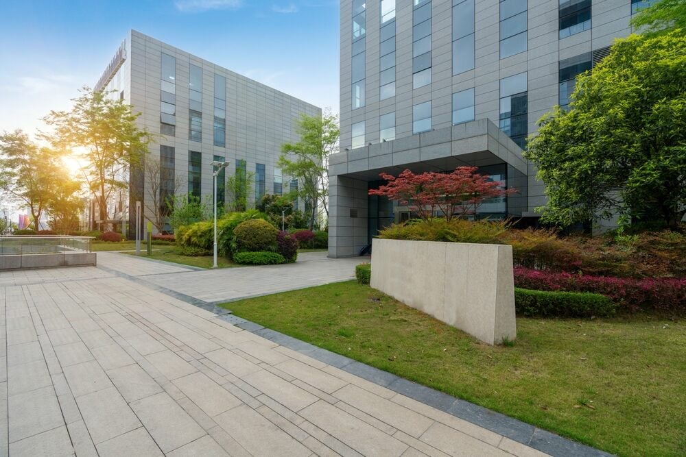 Exterior of commercial building with landscaping and hardscapes